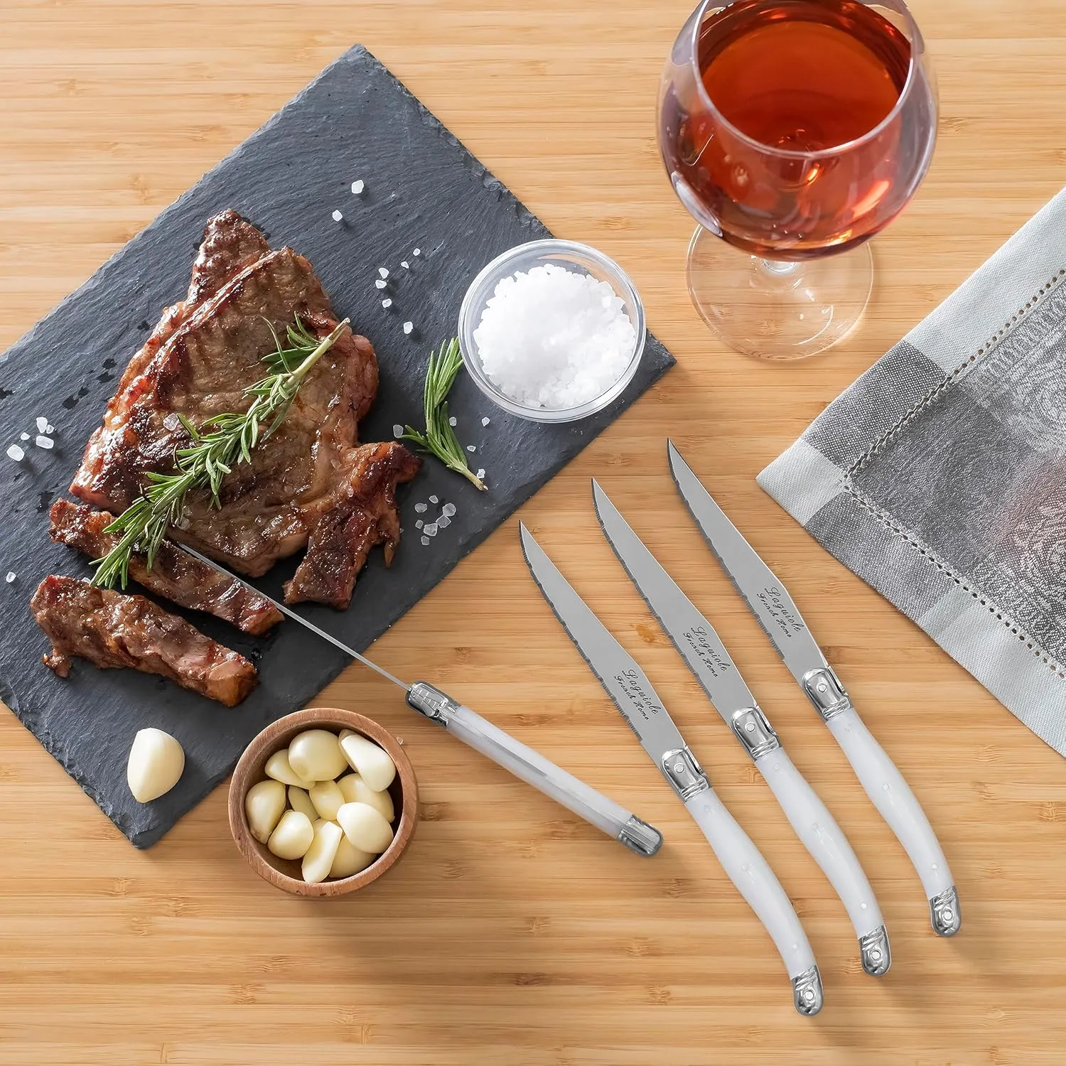 French Home Laguiole 4-Piece Steak Knife Set – Sophisticated Stainless Steel Dinner Knives with Pearlized White Handles & Iconic Bee Emblem – Serrated Knives for Smooth Cutting (9.25")