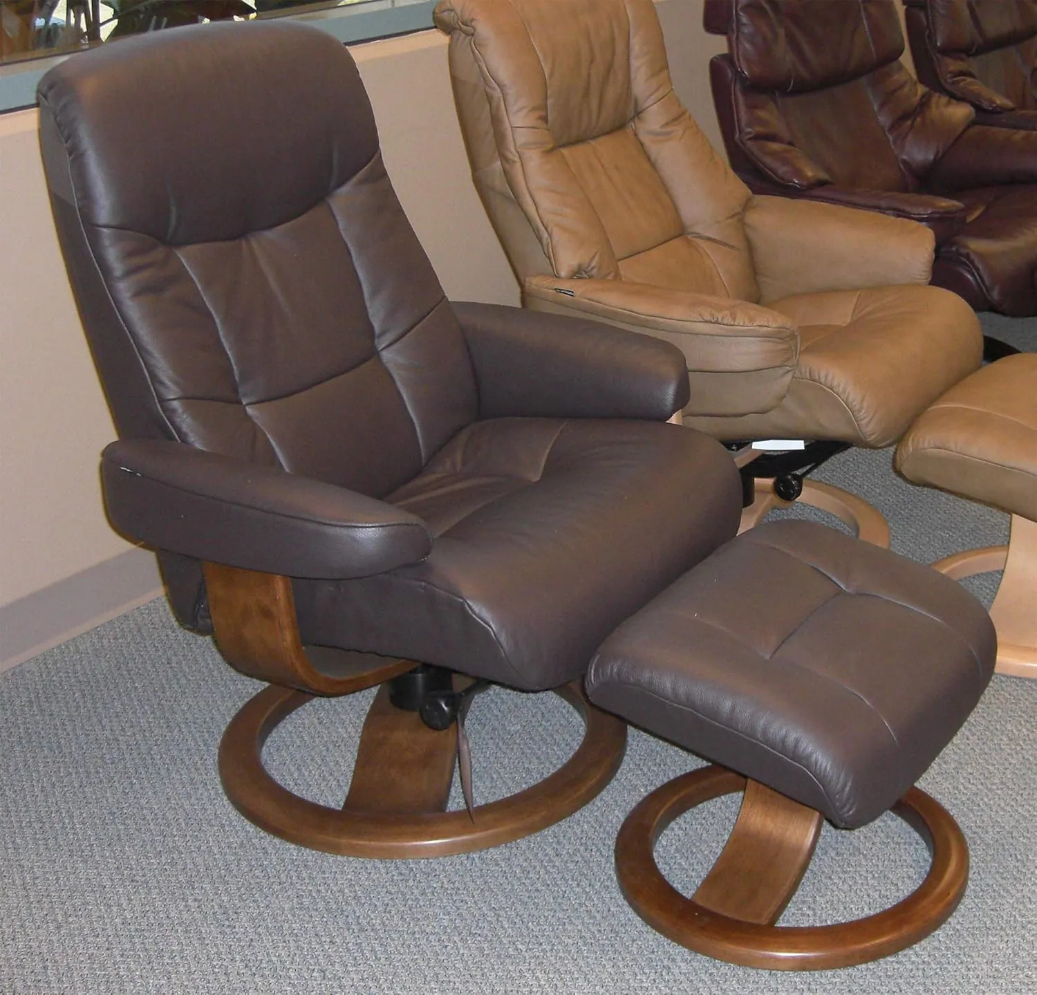 Large Leather Swivel Recliner Chair with Ottoman in Havana Dark Brown NL 120 Nordic Line Leather with a Espresso Wood Stain Base